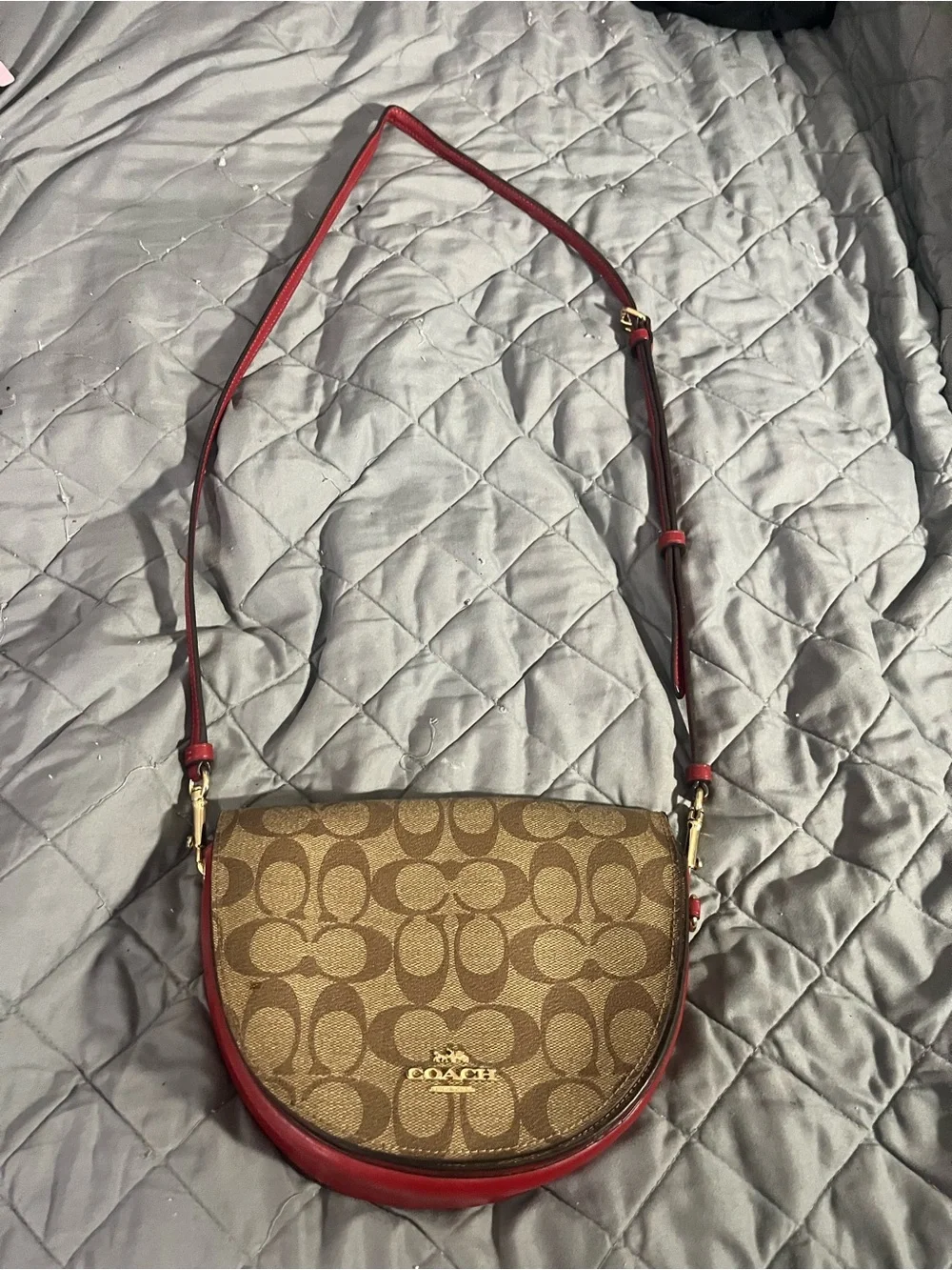 Coach Signature Canvas Saddle Crossbody Bag in Brown and Red